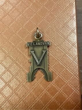 Martin:  Villanovan University 10k. Yellow gold estates sale charm/pendant.